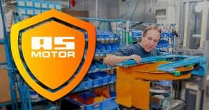 AS-Motor warranty highlight, showcasing the craftsmanship inside the AS-Motor factory. A man is torquing down the main bolt for the mower blade